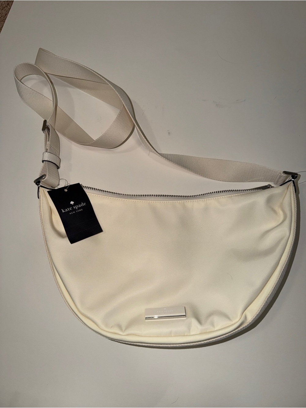 kate spade Cream Crescent Canvas Crossbody Bag